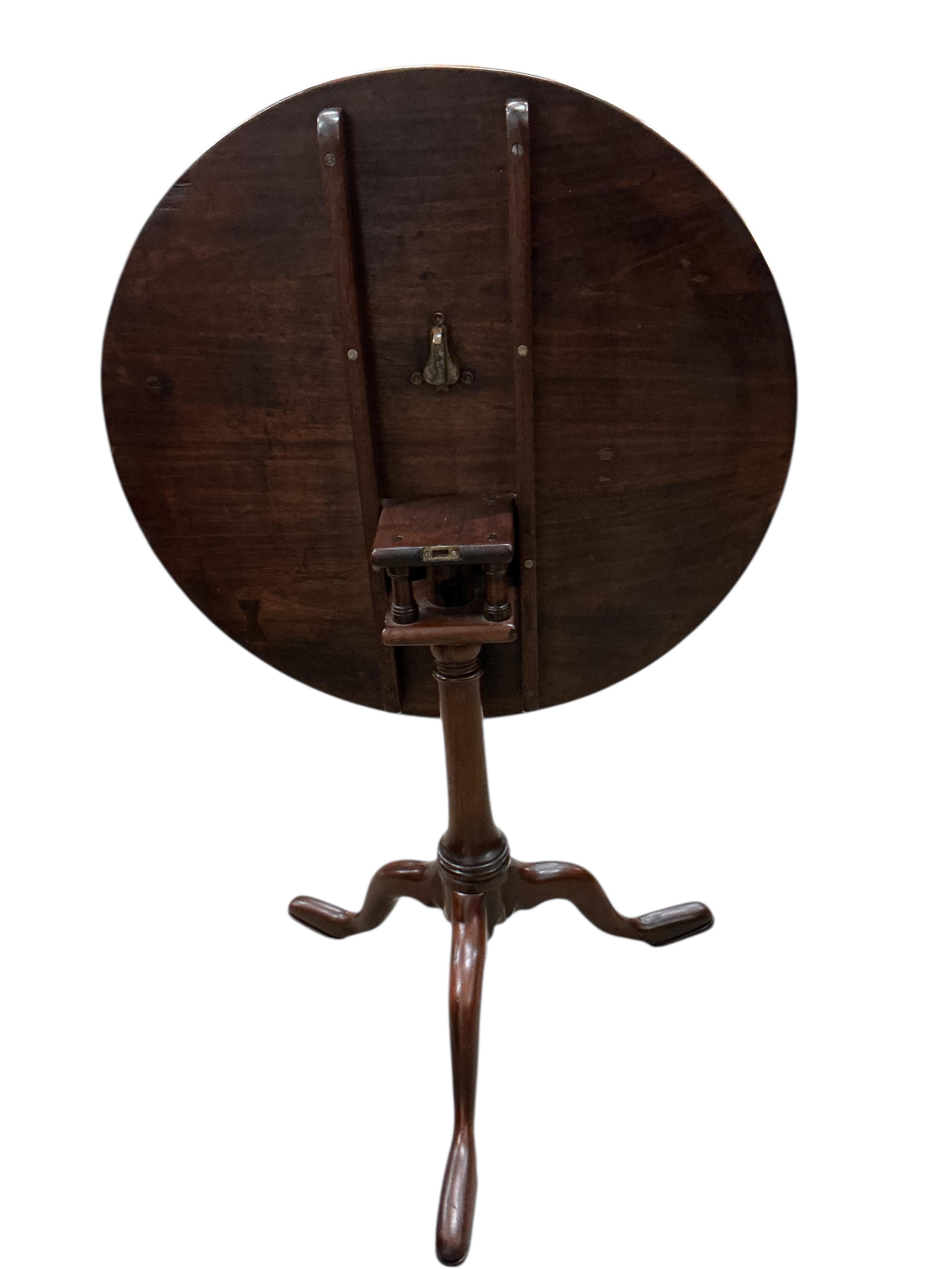 A George III mahogany circular tilt top birdcage tea table, diameter 70cm, height 72cm together with a similar smaller wine table